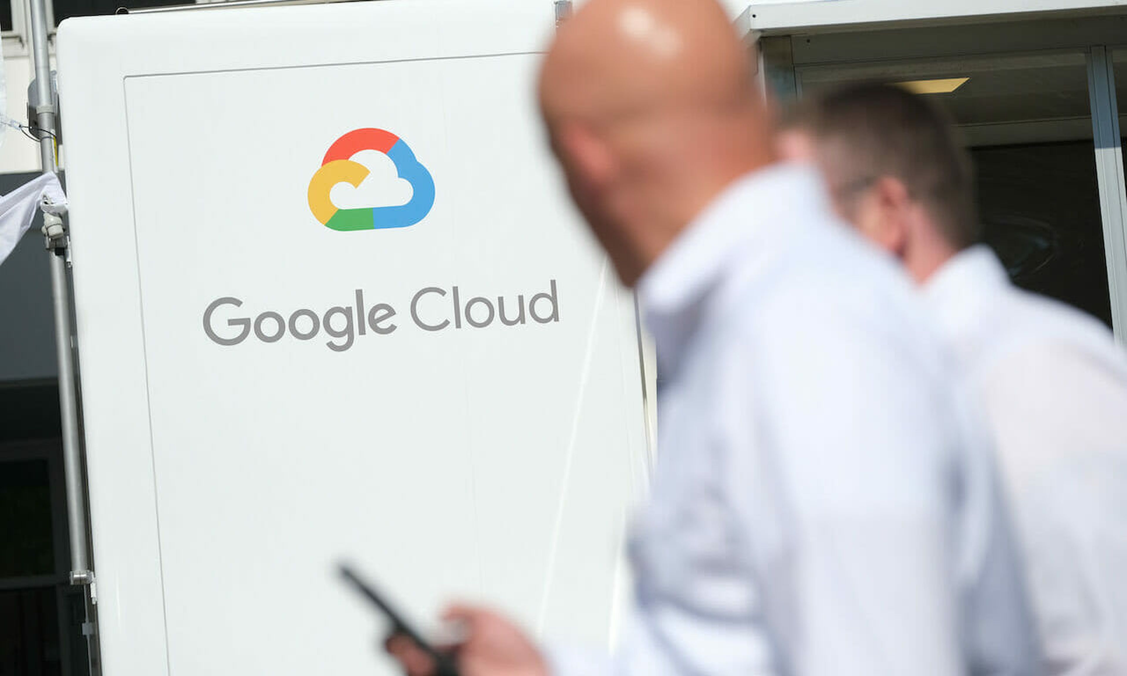 People walk past a Google Cloud exhibit during the at the 2019 IAA Frankfurt Auto Show on Sept. 11, 2019, in Frankfurt am Main, Germany. (Sean Gallup/Getty Images)