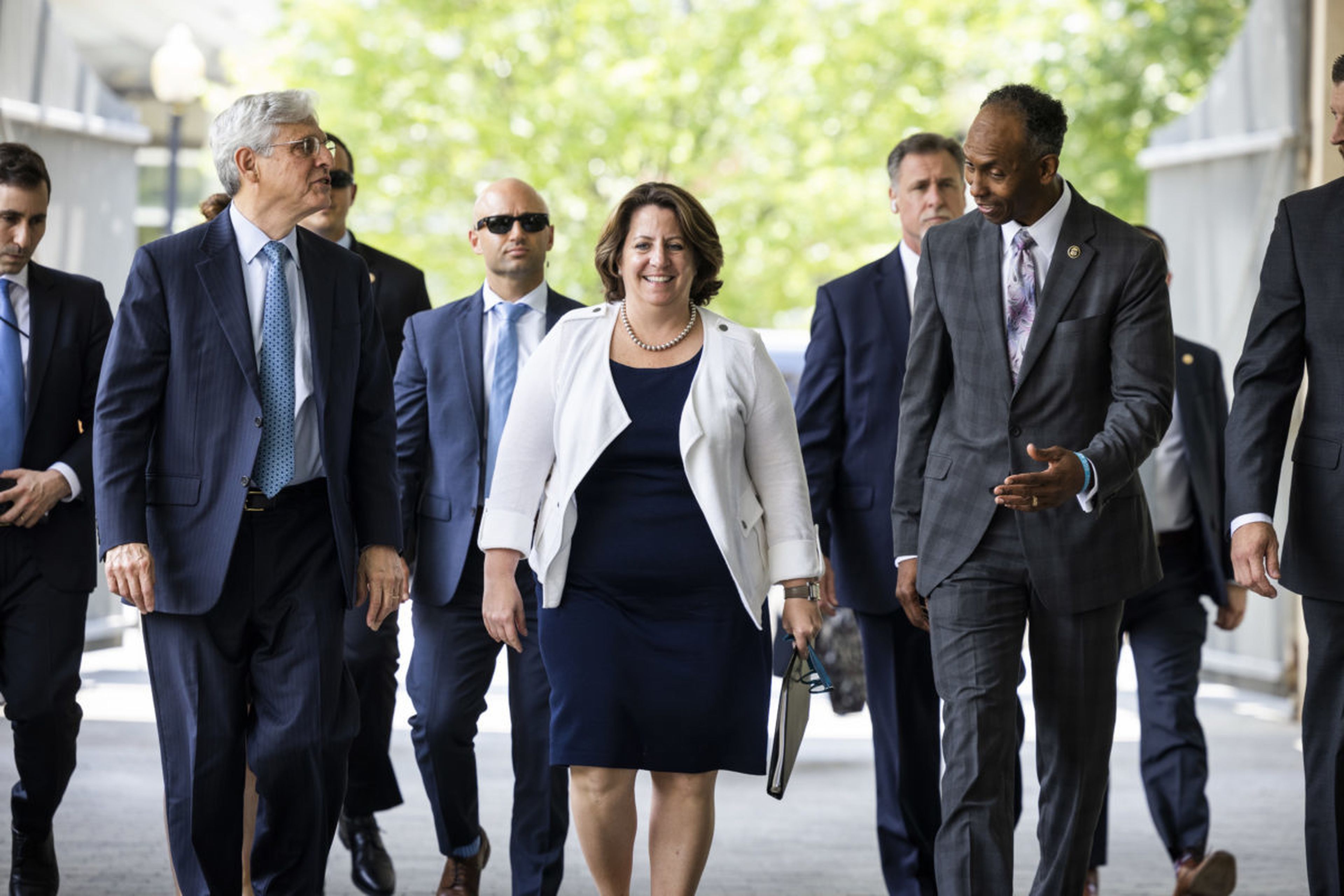 Deputy Attorney General Lisa Monaco (C), US Attorney General Merrick Garland (L), hnd Acting Alcohol, Tobacco and Firearms (ATF) Director Marvin G. Richardson (R), arrives to announce the launch of the Justice Departments five cross-jurisdictional trafficking strike forces at the ATF on July 22, 2021 in Washington, DC. Monaco will help lead a new C...