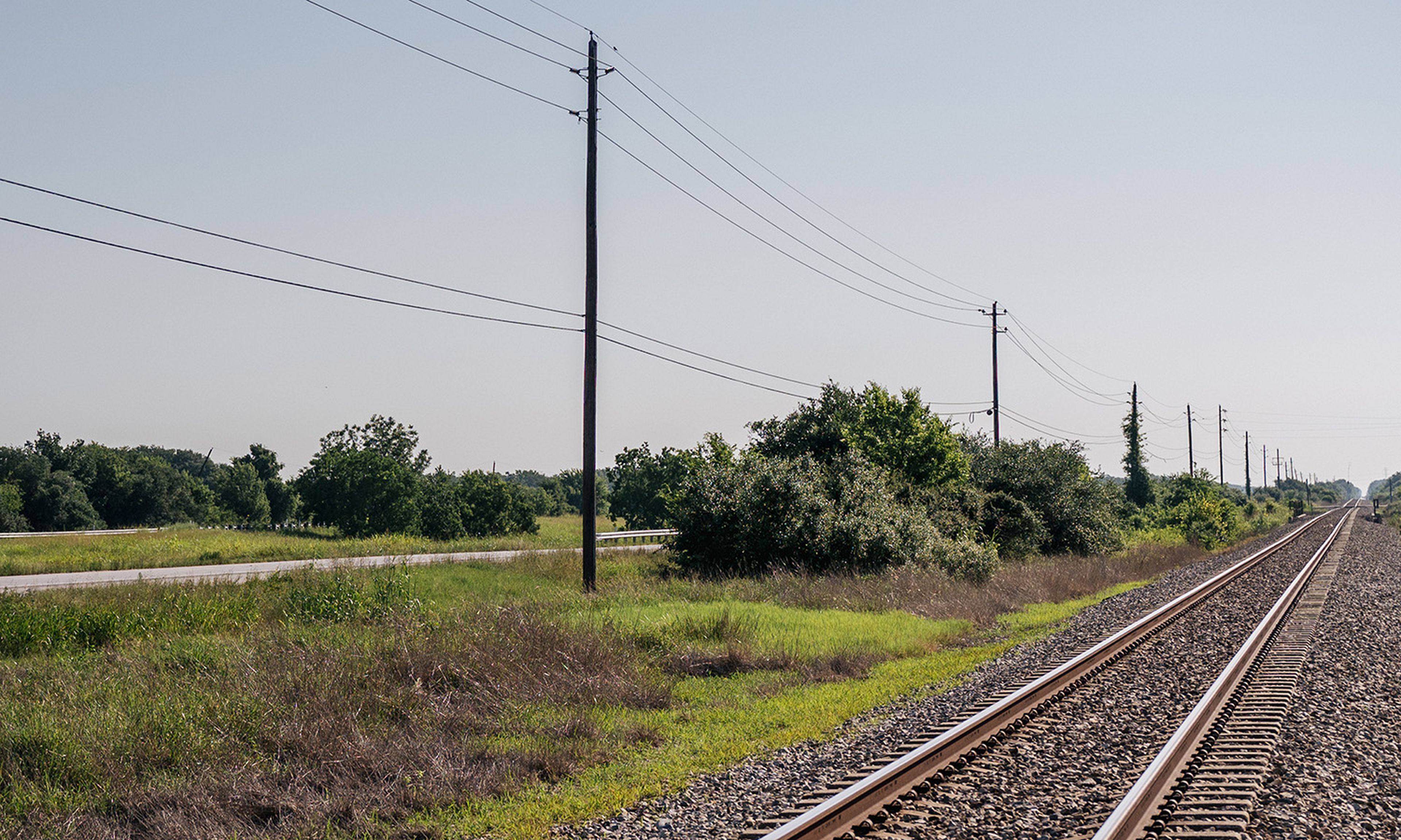 Power-lines are shown on June 15, 2021, in Ganado, Texas. (Photo by Brandon Bell/Getty Images)