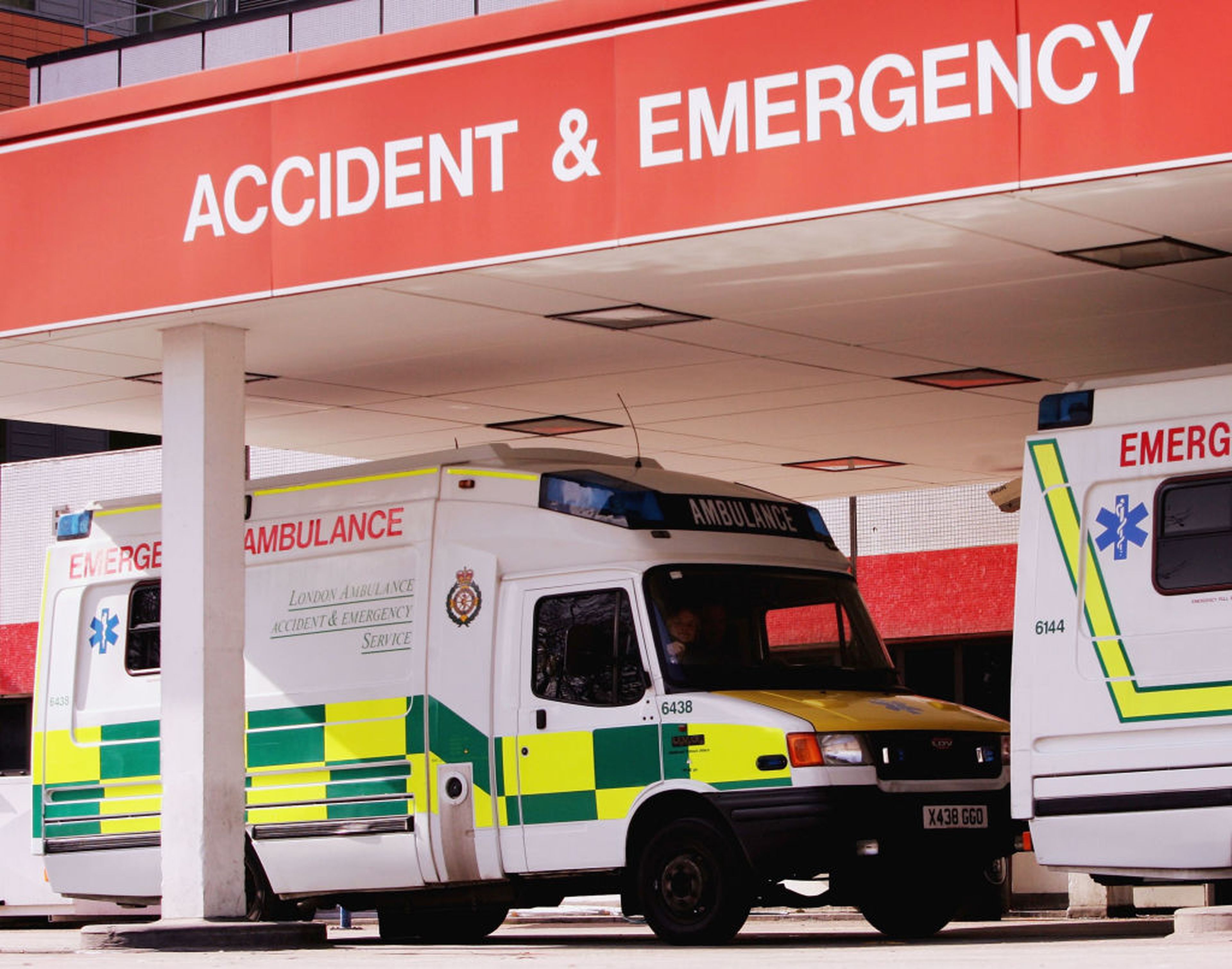 Ambulances are seen at the Accident and Emergency department of St. Thomas&#8217; Hospital on March 3, 2005, in London. (Photo by Graeme Robertson/Getty Images)