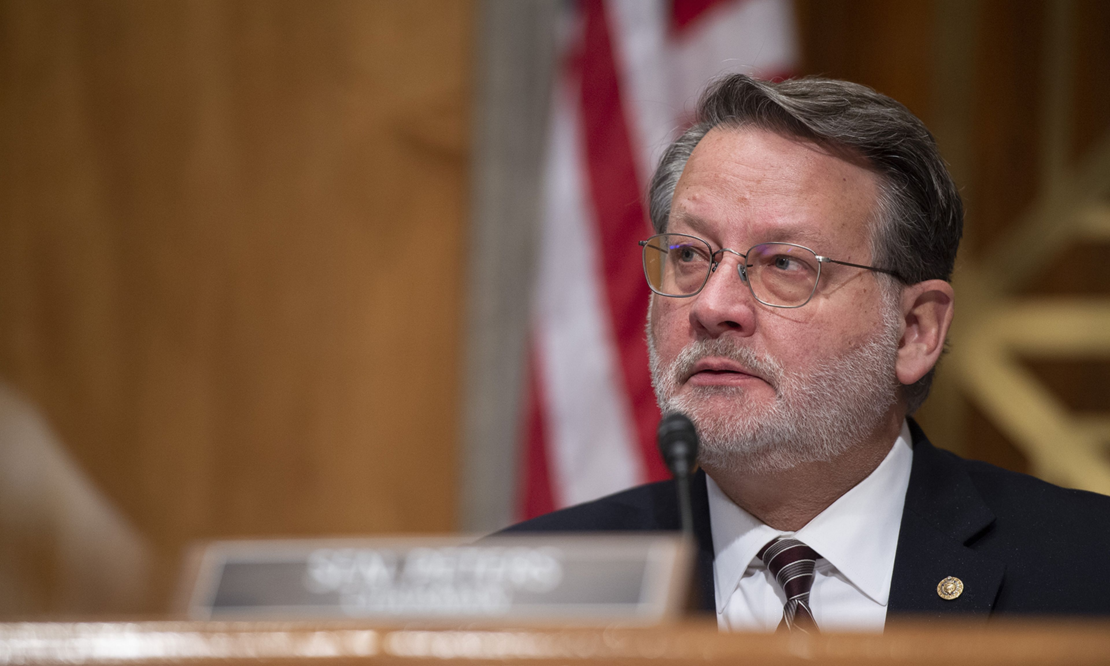 Chairman Sen. Gary Peters, D-Mich., speaks during a Senate Homeland Security and Governmental Affairs Committee hearing on Feb. 1, 2022, in Washington. (Photo by Bonnie Cash/Pool via Getty Images)
