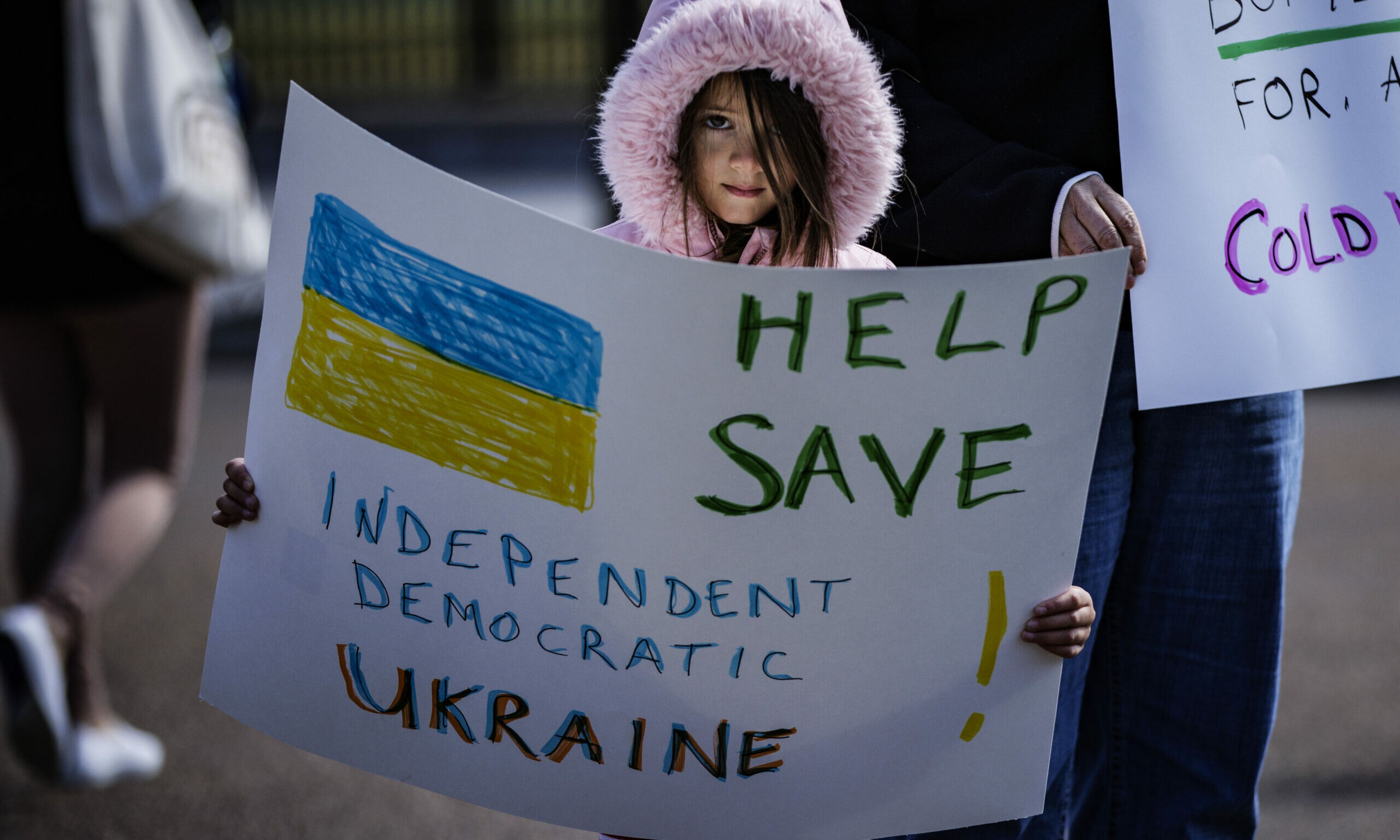Pro-Ukrainian demonstrators gather outside of the White House to protest the Russian invasion on Feb. 25, 2022, in Washington. Russian President Vladimir Putin launched a full-scale invasion of Ukraine on Feb. 24. (Photo by Samuel Corum/Getty Images)