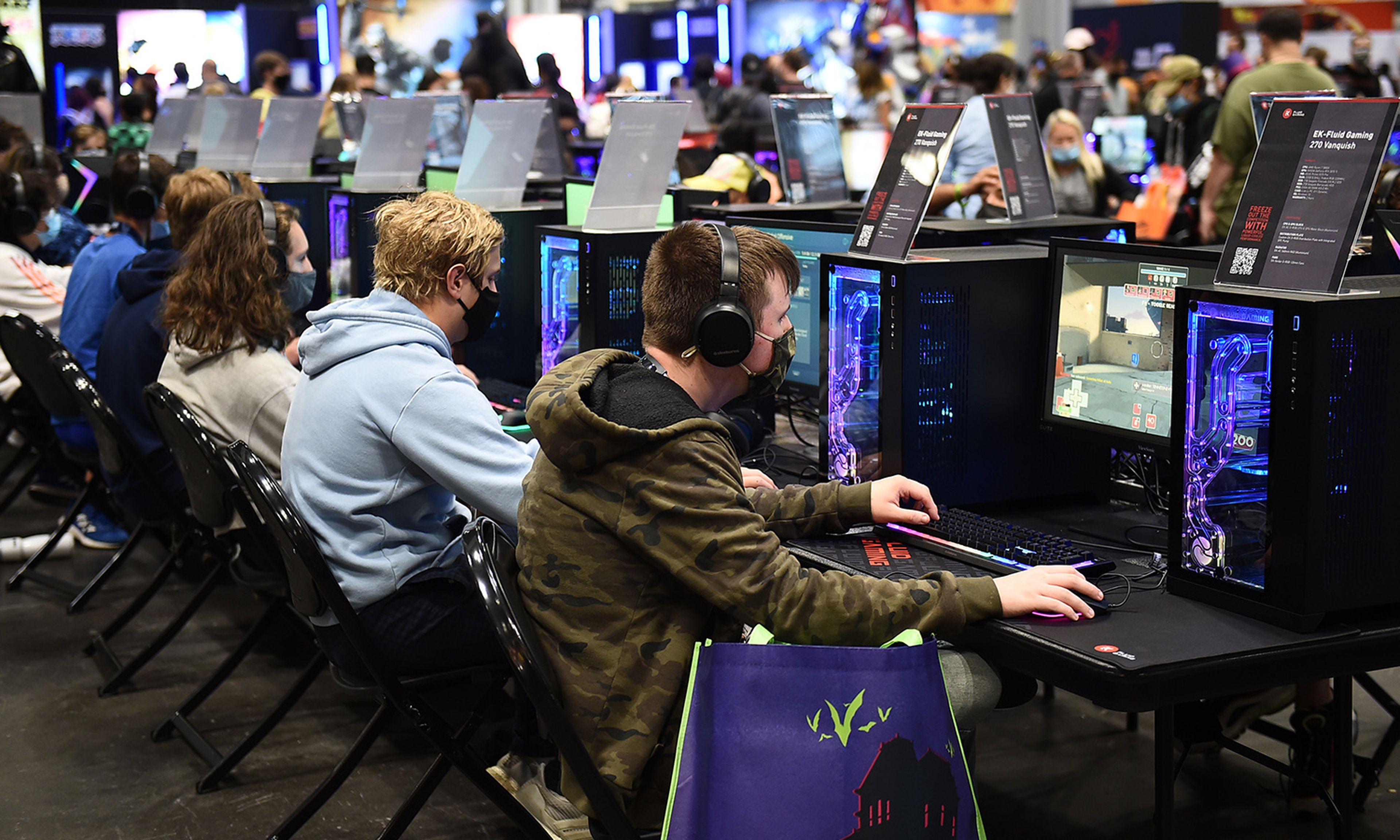 Gamers test the systems in the Gaming Zone during Day 3 of New York Comic Con 2021 at Jacob Javits Center on Oct. 9, 2021, in New York City. (Photo by Ilya S. Savenok/Getty Images for ReedPop)