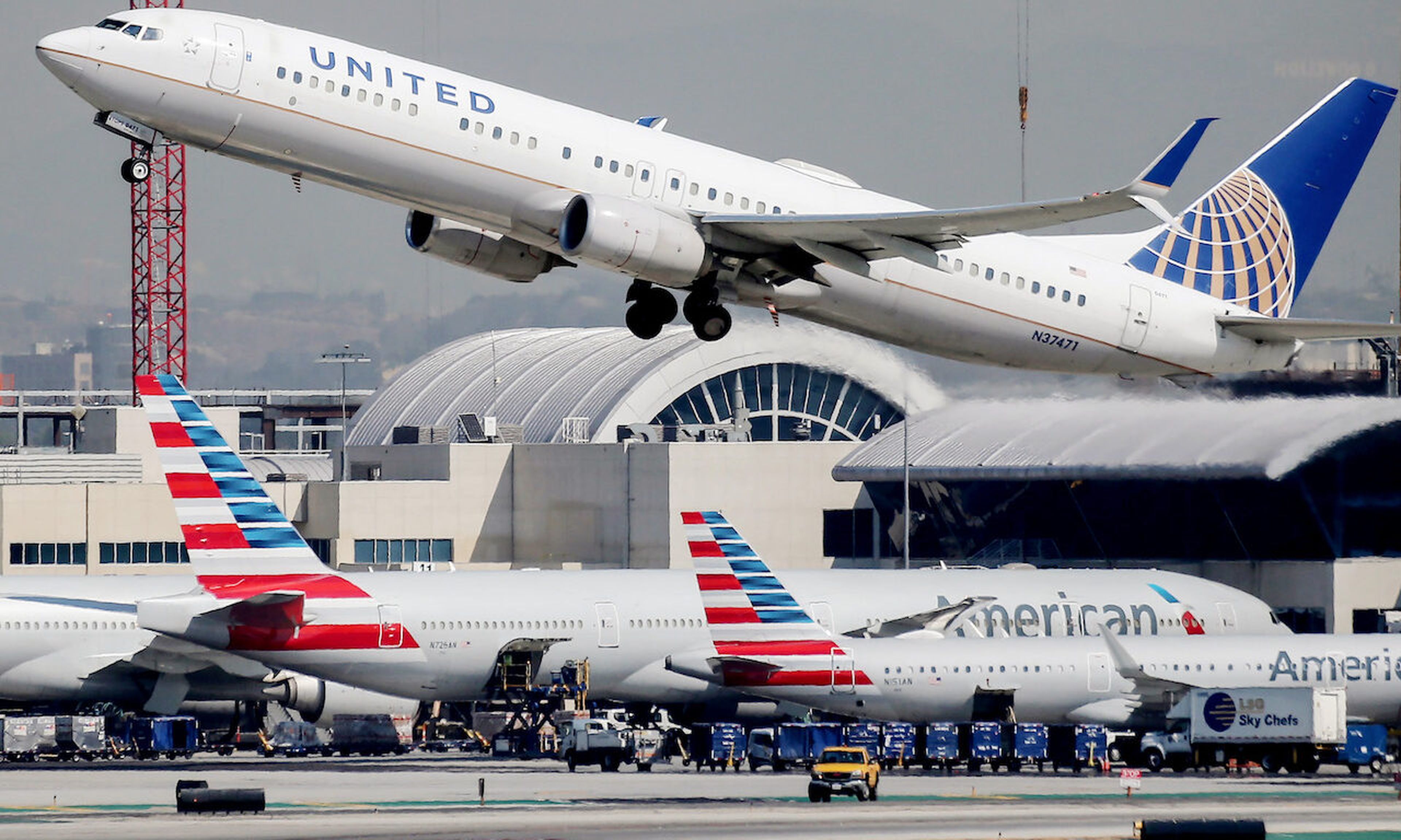 A United Airlines plane takes off at Los Angeles International Airport (LAX) on October 1, 2020 in Los Angeles, California. LAX was among the airports that saw their websites go down as a result of a DDoS attack Monday.   (Photo by Mario Tama/Getty Images)