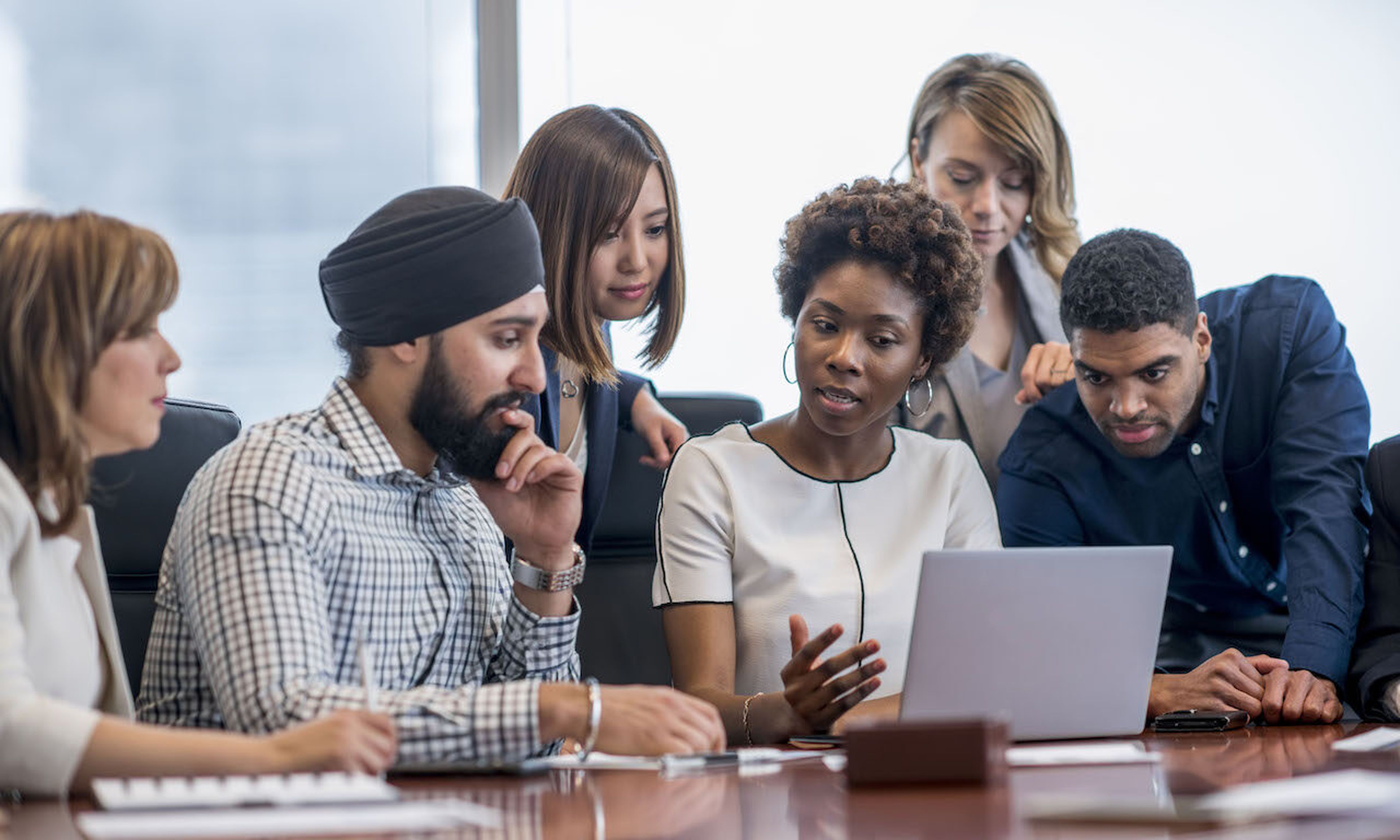 Today’s columnist, Clar Rosso of (ISC)², writes that diversity, equity, and inclusion programs can help companies bridge the cybersecurity workforce gap. (Credit: Stock Photo, Getty Images)