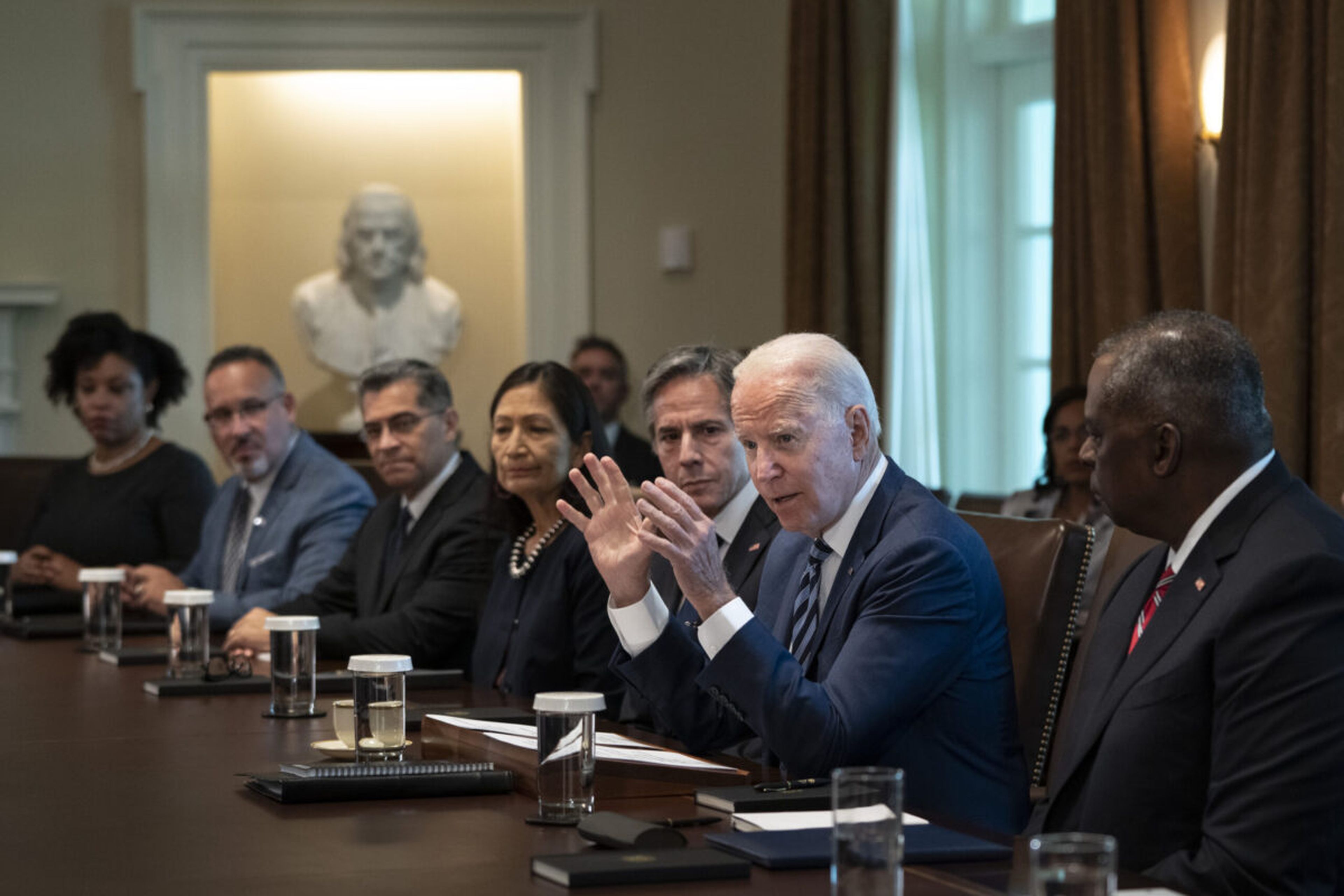 President Joe Biden speaks at the start of a Cabinet meeting at the White House on July 20, 2021, in Washington. The administration released it&#8217;s long-awaited cyber strategy Thursday, calling on American society to shift responsibility for insecure tech from users to manufacturers. (Photo by Drew Angerer/Getty Images)