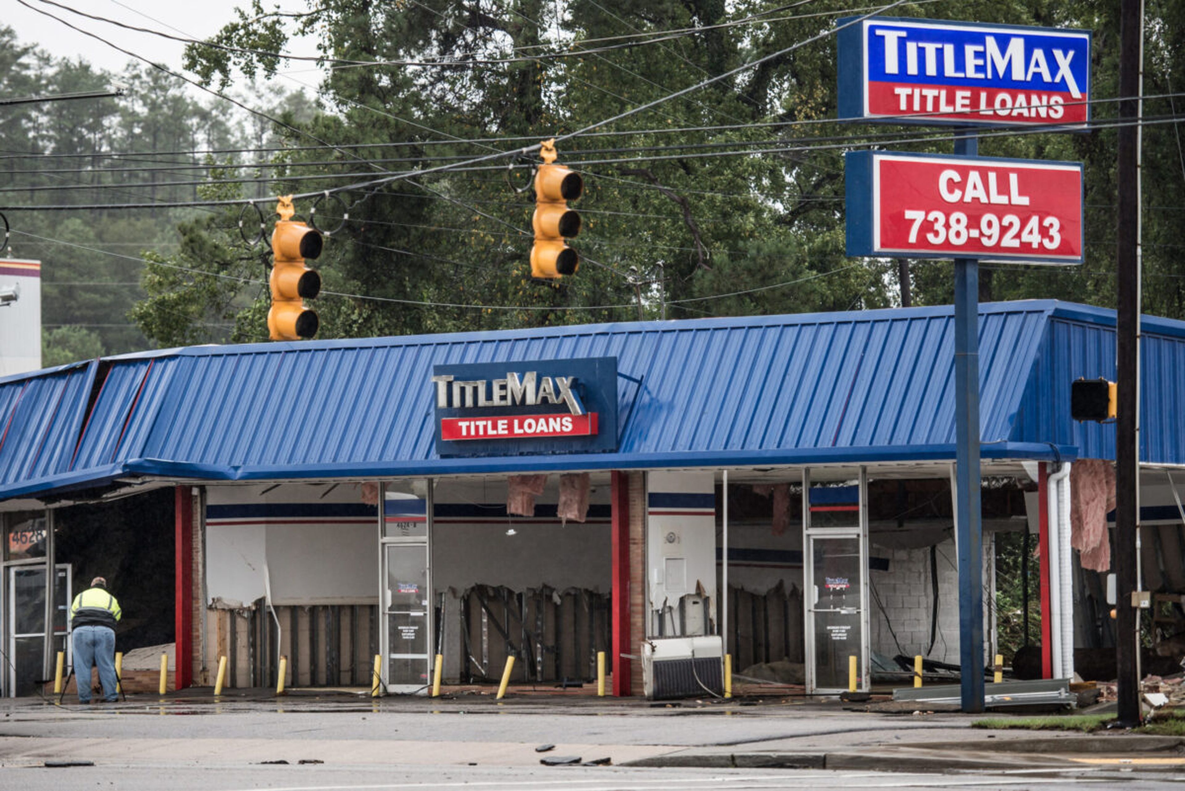 A TitleMax store shows damage from yesterday&#8217;s flood waters on Garners Ferry Road following flooding in the area October 5, 2015 in Columbia, South Carolina.  High-cost lender TMX Finance and its affiliates TitleMax, TitleBucks, and InstaLoan have collectively disclosed a data breach affecting nearly five million customers. (Photo by Sean Ray...