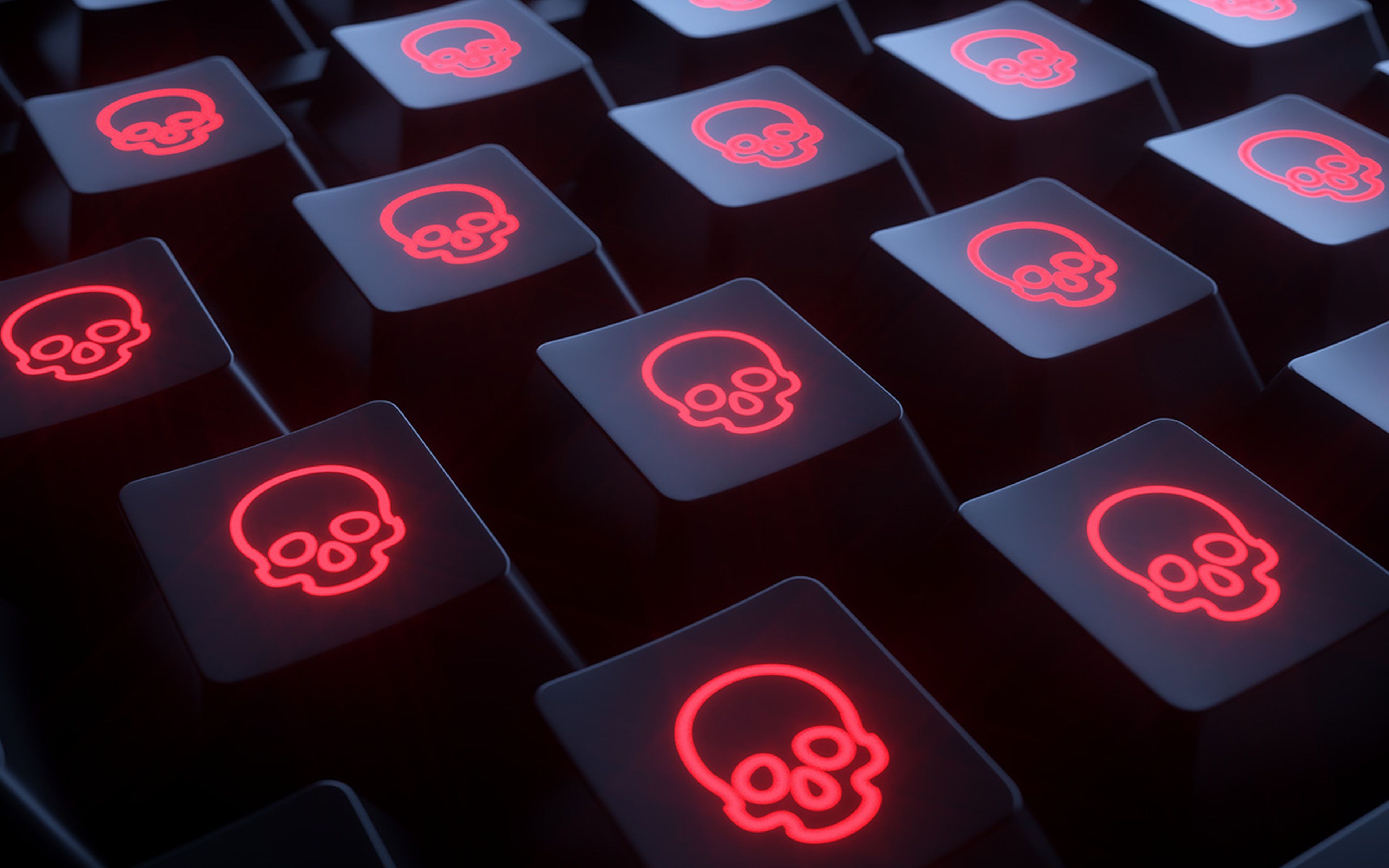 Closeup keyboard with skulls. Infected computer.