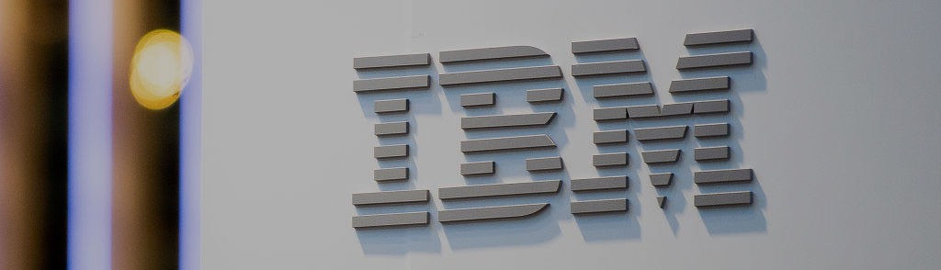 BARCELONA, SPAIN &#8211; FEBRUARY 26:  A logo sits illumintated outside the IBM booth on day 2 of the GSMA Mobile World Congress 2019 on February 26, 2019 in Barcelona, Spain. The annual Mobile World Congress hosts some of the world&#8217;s largest communications companies, with many unveiling their latest phones and wearables gadgets like foldable...