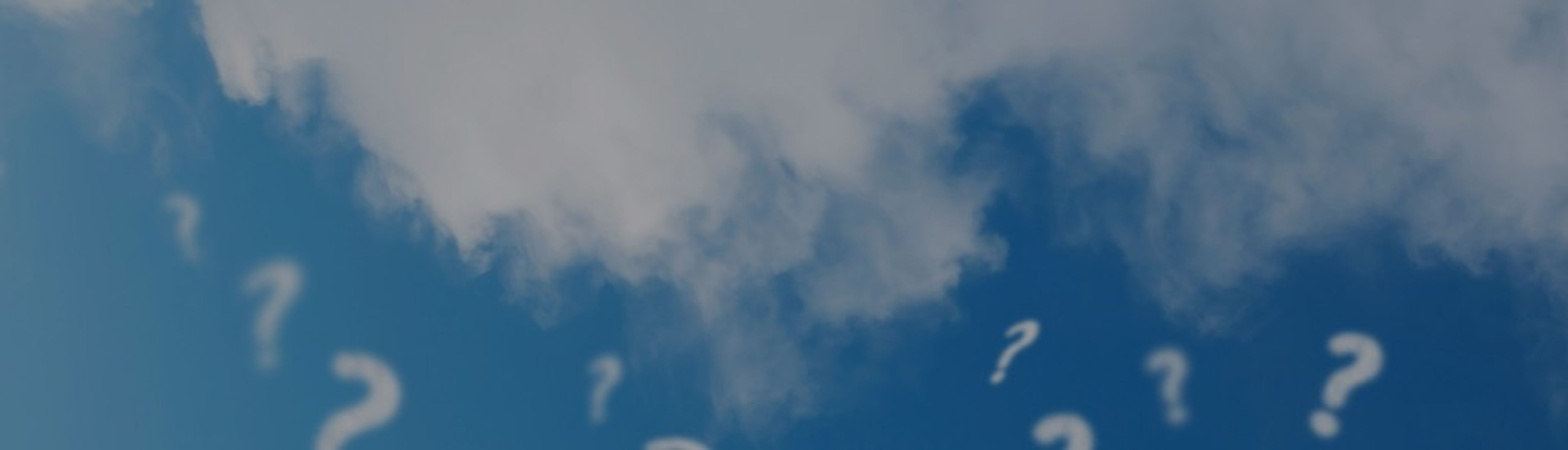 Question mark cloud on blue sky