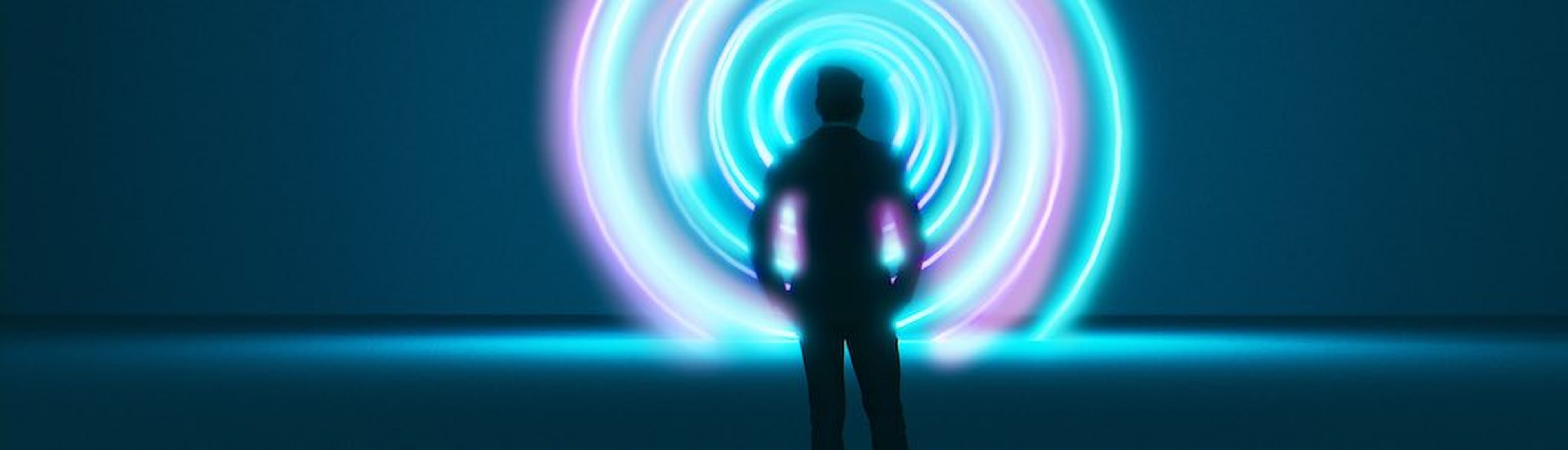 Colorful portal or vortex with a spiral pattern. Man stands in front of it undecided. Maybe it is a time machine.