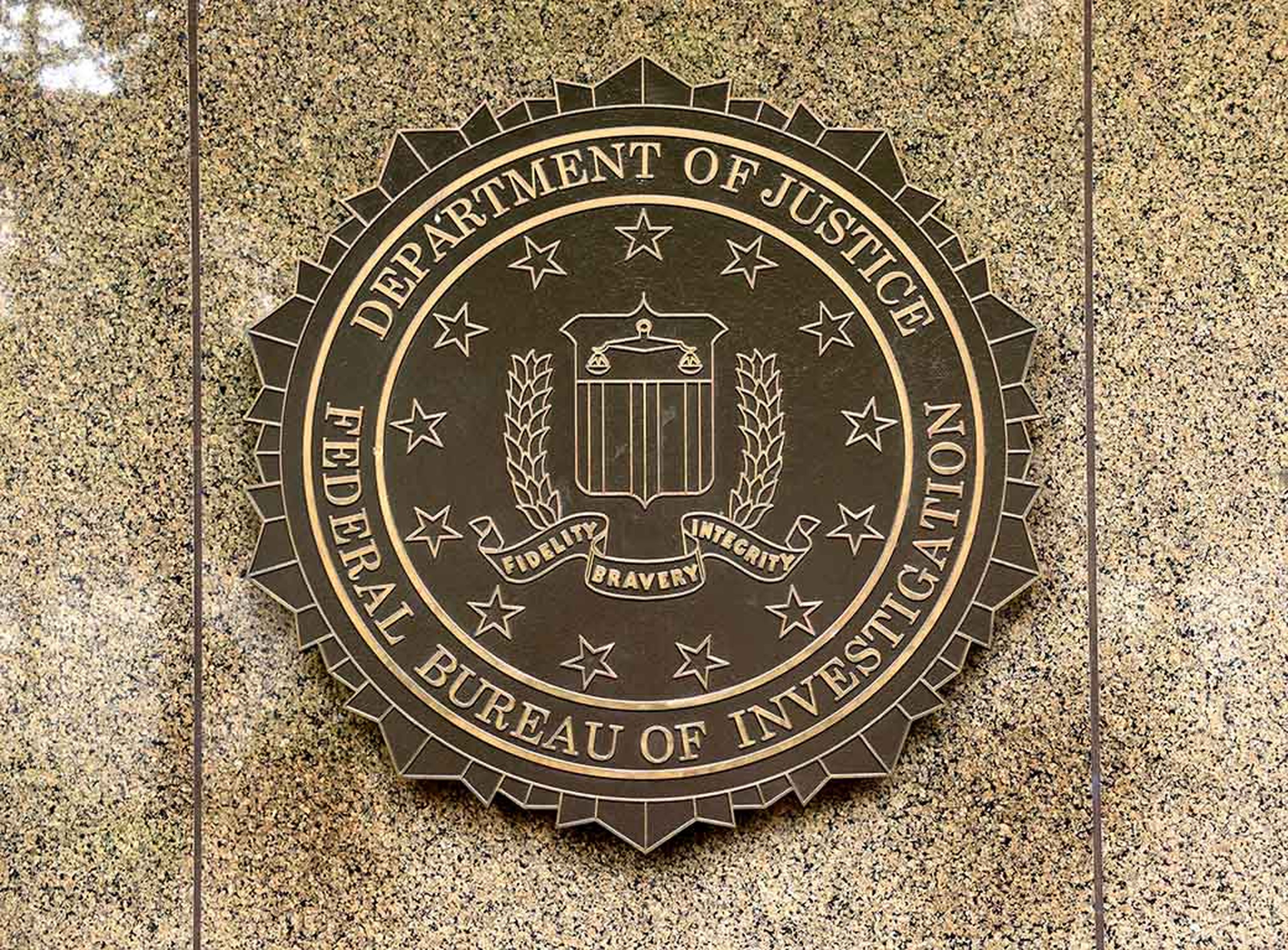 The FBI seal is seen on its headquarters at the J. Edgar Hoover FBI building in Washington.
