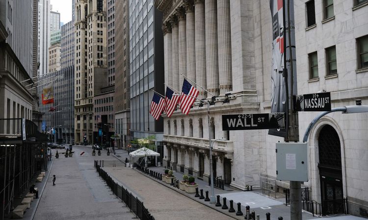 The New York Stock Exchange stands in lower Manhattan on May 18, 2020. Today’s columnist, Paul Mang of Guidewire, writes that the financial world has gotten smarter about cybersecurity – they can tell when a company has invested in cyber. (Photo by Spencer Platt/Getty Images)
