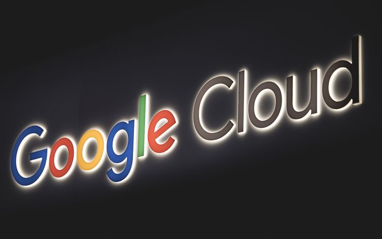 An illuminated Google Cloud sign